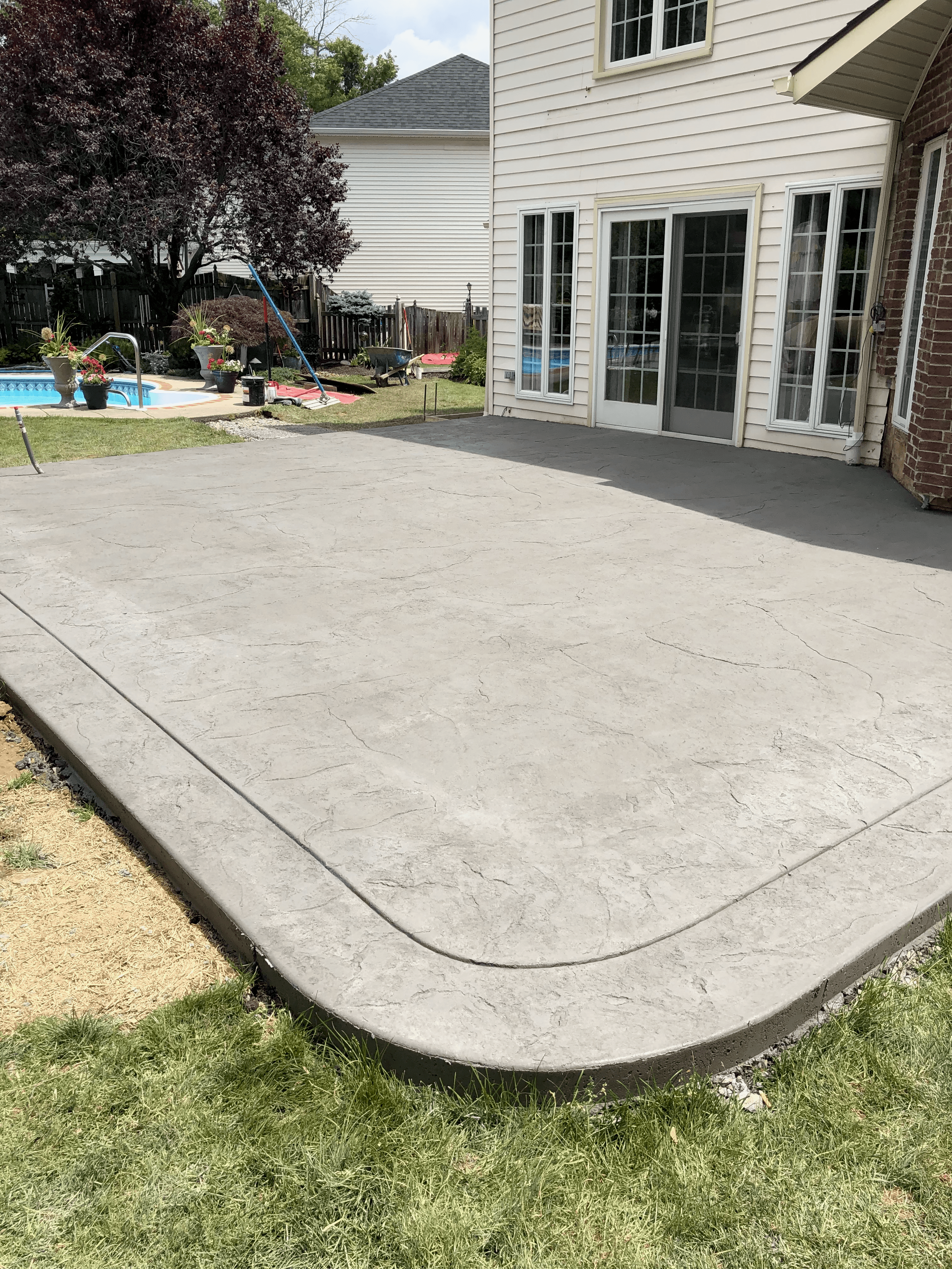 Modern Poolside Concrete Patio